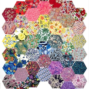 May include: A colourful patchwork quilt made of hexagonal fabric pieces. The quilt is made up of a variety of floral patterns and colours, including red, pink, yellow, green, blue, purple, and white.