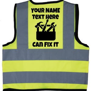 May include: A yellow and grey safety vest with reflective stripes. The vest has a black patch on the back that says "YOUR NAME TEXT HERE" and shows a toolbox with tools. The text "CAN FIX IT" is below the toolbox.