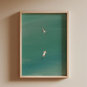 Man and Woman Floating in Pool | Swimming Pool Wall Art | Summer Poster | Beach House Decor | Minimalist Unframed Matte Physical Art Print