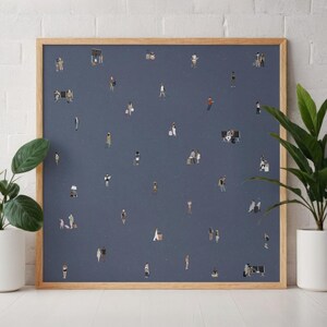 May include: A square framed wall art piece featuring a dark blue background populated with numerous small, illustrated figures of people in various poses, some standing, walking, or sitting on benches, creating a scattered, busy scene.