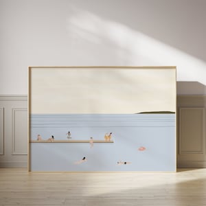 May include: A framed illustration of a light blue ocean with a wooden dock. There are several figures in the water and on the dock. The figures are all in various shades of brown and tan. There is a pink inflatable ring in the water.