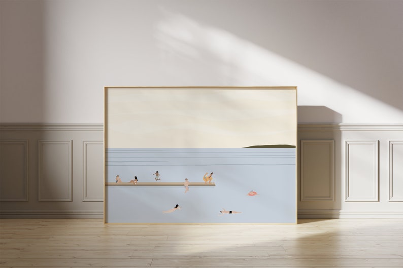 May include: A framed illustration of a light blue ocean with a wooden dock. There are several figures in the water and on the dock. The figures are all in various shades of brown and tan. There is a pink inflatable ring in the water.