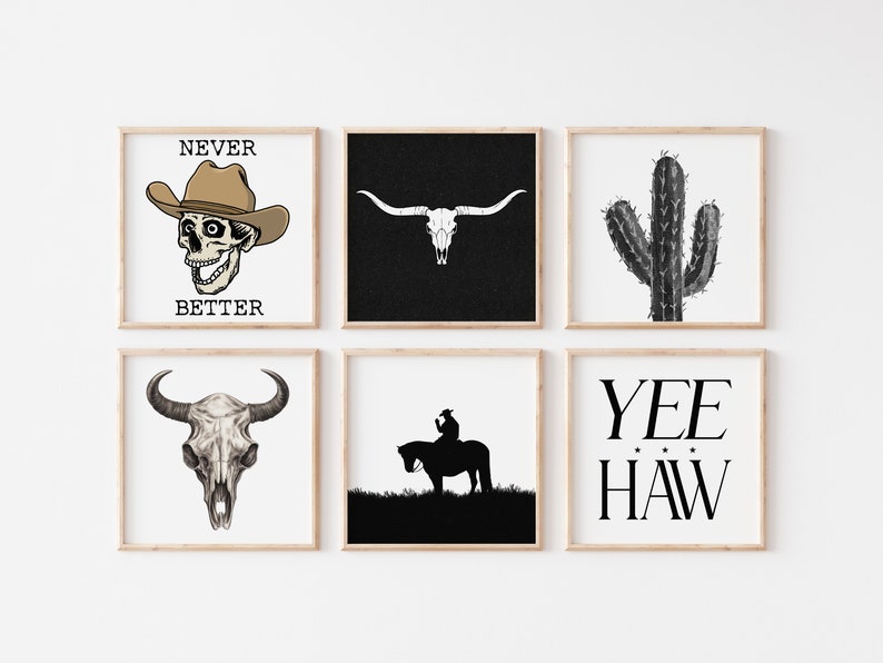May include: Six black and white framed prints with western themes. The prints include a skull wearing a cowboy hat with the text "Never Better", a longhorn skull, a cactus, a silhouette of a cowboy riding a horse, and the text "Yee Haw".