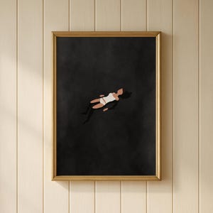 May include: A framed wall art print featuring a minimalist illustration of a figure floating in a vast, solid black space. The figure is depicted in a white top and shorts, with light skin tones, positioned centrally against the dark background.