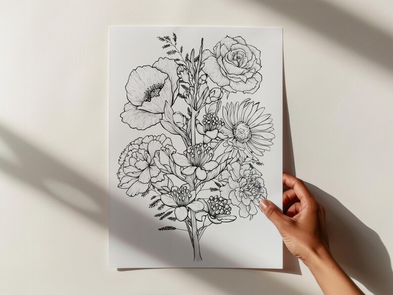May include: A black and white line drawing of a bouquet of flowers, including roses, poppies, and daisies.