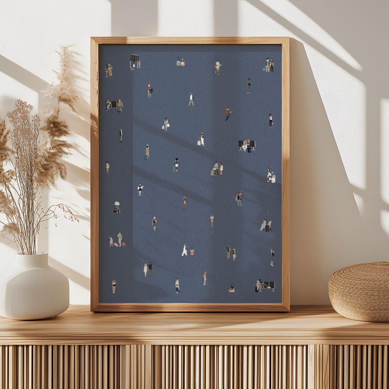 May include: A framed rectangular wall art print featuring a dark blue background populated with numerous small, scattered illustrations of people in various poses, including individuals walking, sitting, and standing in a sparse, minimalist arrangement.
