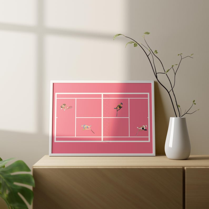 May include: A framed print of a pink tennis court with five figures in various poses. The figures are all wearing different colored clothing and are positioned on the court in a playful and abstract way.