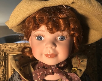 Cute Red Headed Porcelain Doll With Her Teddy Bear