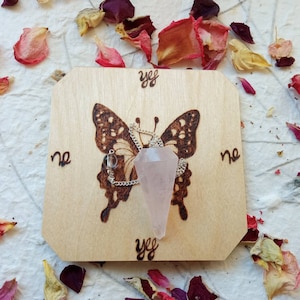1 pc rose quartz crystal pendulum + 1 pendulum board of your choice - tool for witchcraft - for witches, pagans and wiccans