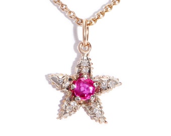 Colgante vintage con estrella de diamantes y rubíes