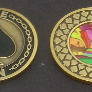 Nueva moneda Disc Golf Art Ace.