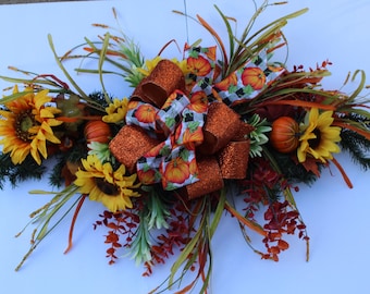 Fall Centerpiece with all of the fall colors tp decorate you table for the holidays