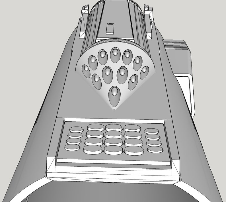 May include: A black and white line drawing of a futuristic weapon with a circular array of small holes and a grid of buttons.