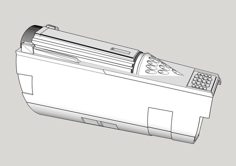 May include: A black and white line drawing of a printer cartridge. The cartridge is cylindrical with a rectangular top. The top has a series of small holes and a larger opening with a series of smaller holes.