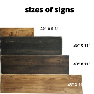 May include: Four wooden signs of different sizes, stacked on top of each other. The signs are made of natural wood with a rustic finish. The sizes of the signs are 20" x 5.5", 36" x 11", 40" x 11", and 48" x 11".