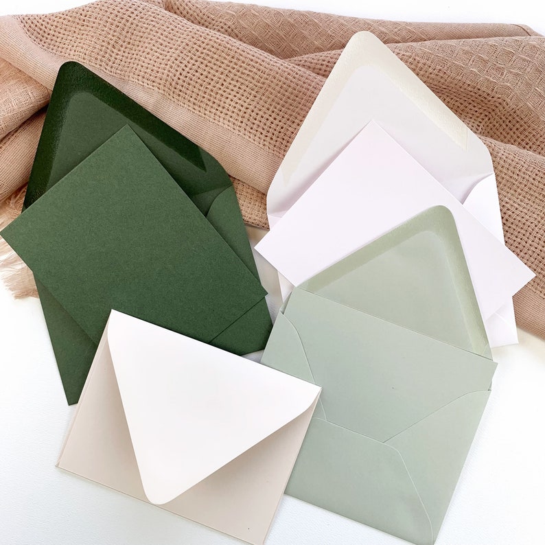 A2 card and envelope sets from Onvalop offered in 48 colors. Dusty Green, Snow, Rain, and Powder Pink shown here. Order blank or printed.