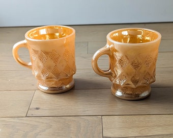 2 Vintage orange mug FireKing Kimberly