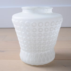 May include: White frosted glass lampshade with a textured pattern of small circles. The shade has a flared base.