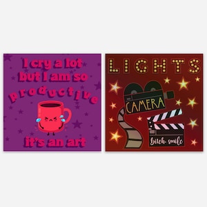 May include: Two purple and red square cards with motivational quotes. The first card has a cartoon coffee cup with a sad face and the text "I cry a lot but I am so productive it's an art". The second card has a red background with yellow stars and the text "LIGHTS CAMERA Bitch. smile".