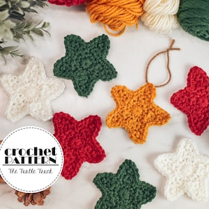 May include: Crochet pattern for a five-pointed star ornament in red, green, white, and yellow. The pattern is called "The Turtle Trunk".