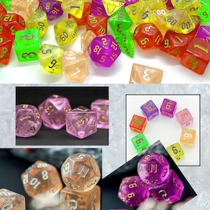 May include: A collection of iridescent dice in various colors, including purple, green, yellow, and orange. The dice are made of clear plastic with gold glitter embedded in the plastic. The dice are numbered with gold lettering.