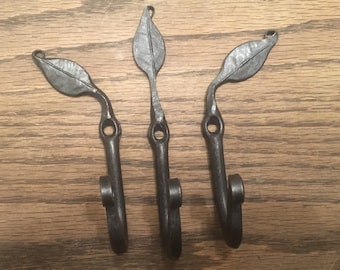 Three Single Leaf Coat Hooks
