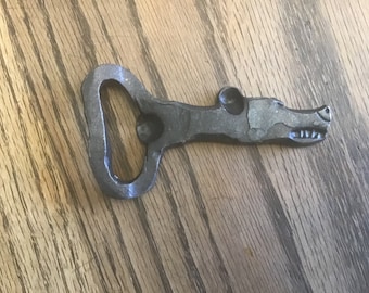 Bear head bottle opener with teeth