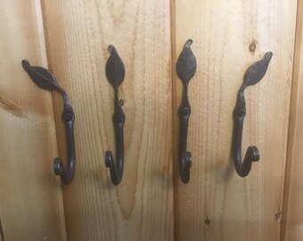 Forged iron leaf hooks group of four