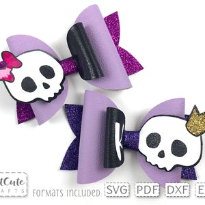 May include: Two purple and black skull hair bows with glitter accents. The bow on the left has a pink butterfly on the skull. The bow on the right has a gold crown on the skull.  Formats included: SVG, PDF, DXF, EPS.