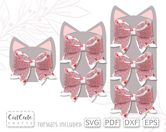 May include: A set of five pink glitter bow cutouts in the shape of a cat head. The cutouts are designed for crafting and include the text "SVG, PDF, DXF, EPS" and "Formats Included".