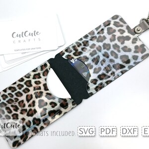 May include: A leopard print card holder with a black card slot and a silver key ring. The card holder is open and a credit card is visible inside. The text "CutCute CRAFTS" is visible on the card holder and on a stack of white cards in the background. The text "Formats Included: SVG PDF DXF EPS" is visible at the bottom of the image.