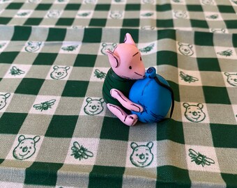 Piglet with a balloon figurine