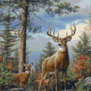 May include: A large buck with a large rack of antlers stands in a forest setting with a smaller deer in the foreground. The deer are brown and the forest is green with a blue sky in the background.