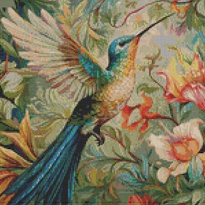 May include: A detailed cross-stitch pattern featuring a hummingbird in flight amidst lush foliage and flowers. The bird has blue, orange, and white feathers, with a long beak. The background is a mix of greens, oranges, and pinks.