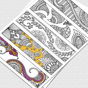 May include: Set of five printable coloring bookmarks featuring intricate black and white floral designs. Each bookmark is designed to fit on an 8.5x11 inch sheet of paper.