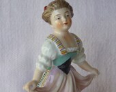 Antique Dresden-type Porcelain Figurine of a Young Girl Dancing, Volkstedt crossed mark in blue.
