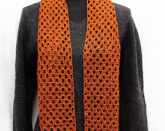 Openwork crochet wool scarf and flower brooch