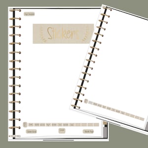 May include: A sticker book with a beige cover and gold lettering that says "Stickers". The book has a spiral binding and is open to a blank page.