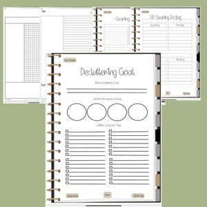 May include: A printable planner page with a black and white design. The page is titled "Decluttering Goal" and includes sections for "Main Decluttering Goal", "Split into Manageable Sections", and "Splitting Goals into Tasks".