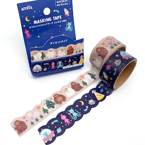 May include: Masking tape rolls with a blue box. The tape features colourful illustrations of space-themed and cryptid creatures. The box reads "MASKING TAPE" and "ダイカットマスキングテープ ふしぎな UMA". Each roll is approximately 20mm wide and 1.5m long.