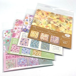 Origami paper flowers with foil applique