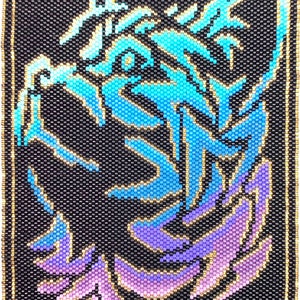 May include: A beaded design of a wolf's head in shades of blue, purple, and pink on a black background. The wolf's head is facing to the left and has a detailed design.