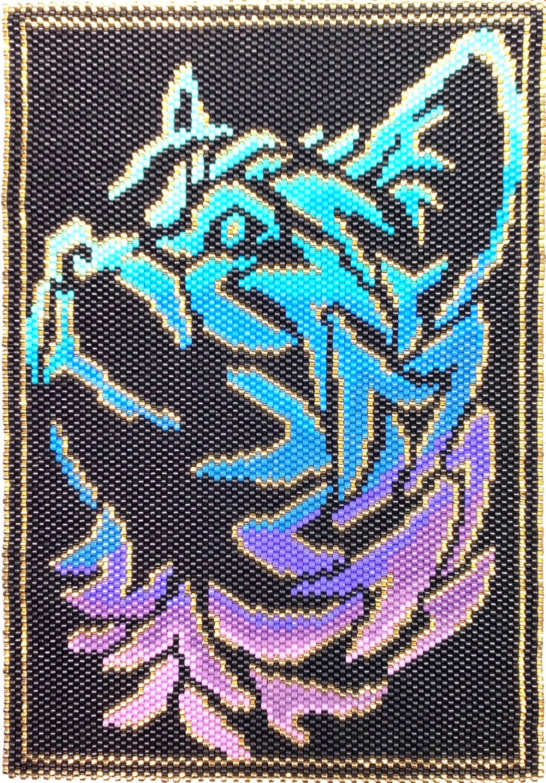 May include: A beaded design of a wolf's head in shades of blue, purple, and pink on a black background. The wolf's head is facing to the left and has a detailed design.