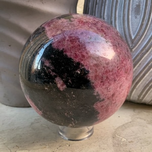rhodonite sphere polished stone metaphysical healing stones rhodonite large sphere carving