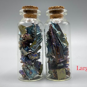 Bismuth crystals in glass jars small jars full of bismuth
