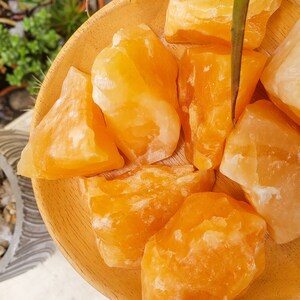 Raw orange calcite rough calcite palm size rough stone