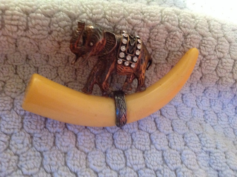 Vintage elephant pin with rhinestones /& Bakelite tusk