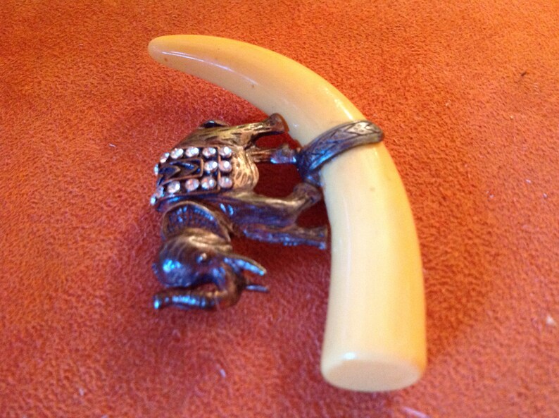 Vintage elephant pin with rhinestones /& Bakelite tusk