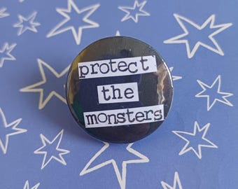 Handmade button protect the monsters