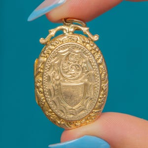 Edwardian 9ct Gold Engraved Oval Locket, Repousse Border